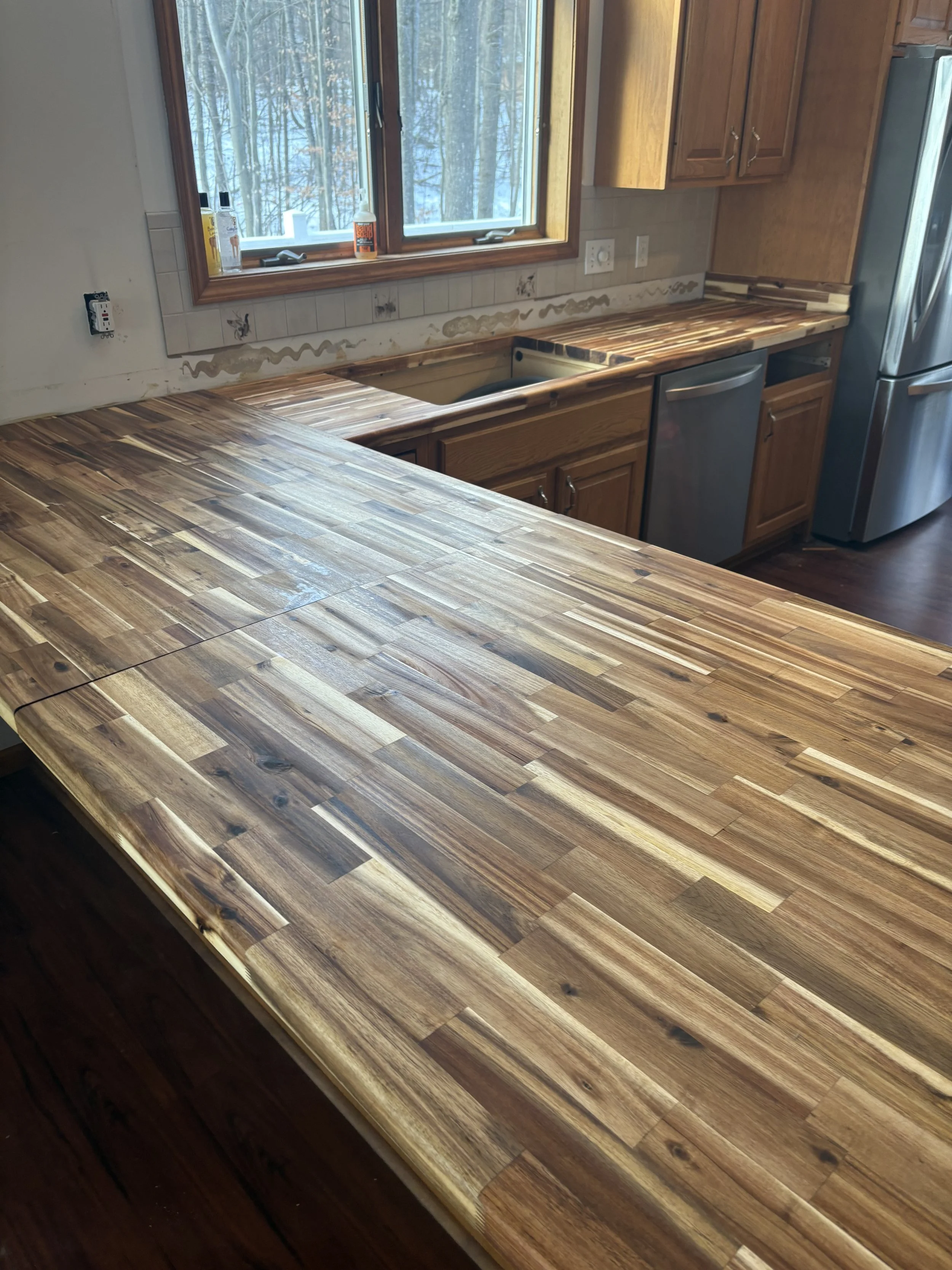 Finished countertop improvement completed by Ned's Home & Lawn Maintenance